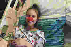 Local 5th grader, Syndi Brown, is all smiles undergoing medical treatment for cancer.