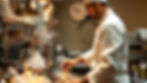 European 5 star restaurant hotel kitchen chef working , equipments have logo of mahalaxmi