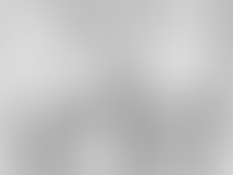 A detailed pencil-style drawing of the exterior of the Water Discovery Centre. In front of the modern glass building stands a large fountain featuring a central statue of Poseidon holding a trident, surrounded by two mermaids on either side. Water sprays upward from the fountain basin, and the building’s name appears prominently across the glass facade behind the statues.