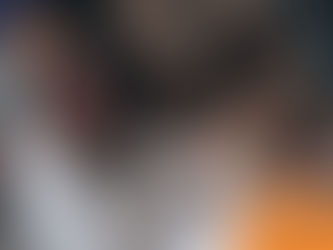 A person with brown hair embraces a white dog in a cozy setting. The dog appears content. "Wilsons Health" logo in the corner.