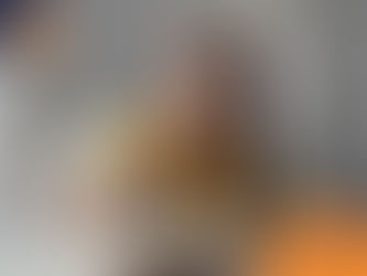 Woman in a yellow sweater reads a book with a beagle beside her. Light background, calm mood. Wilsons Health logo visible.