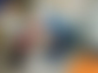 A man in a blue shirt kneels in a kitchen, affectionately touching noses with a Boston Terrier wearing a red bandana. Logo: wilsons HEALTH.