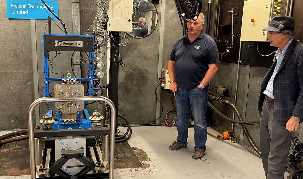 Helical and Geoff Page looking at the engine test cell