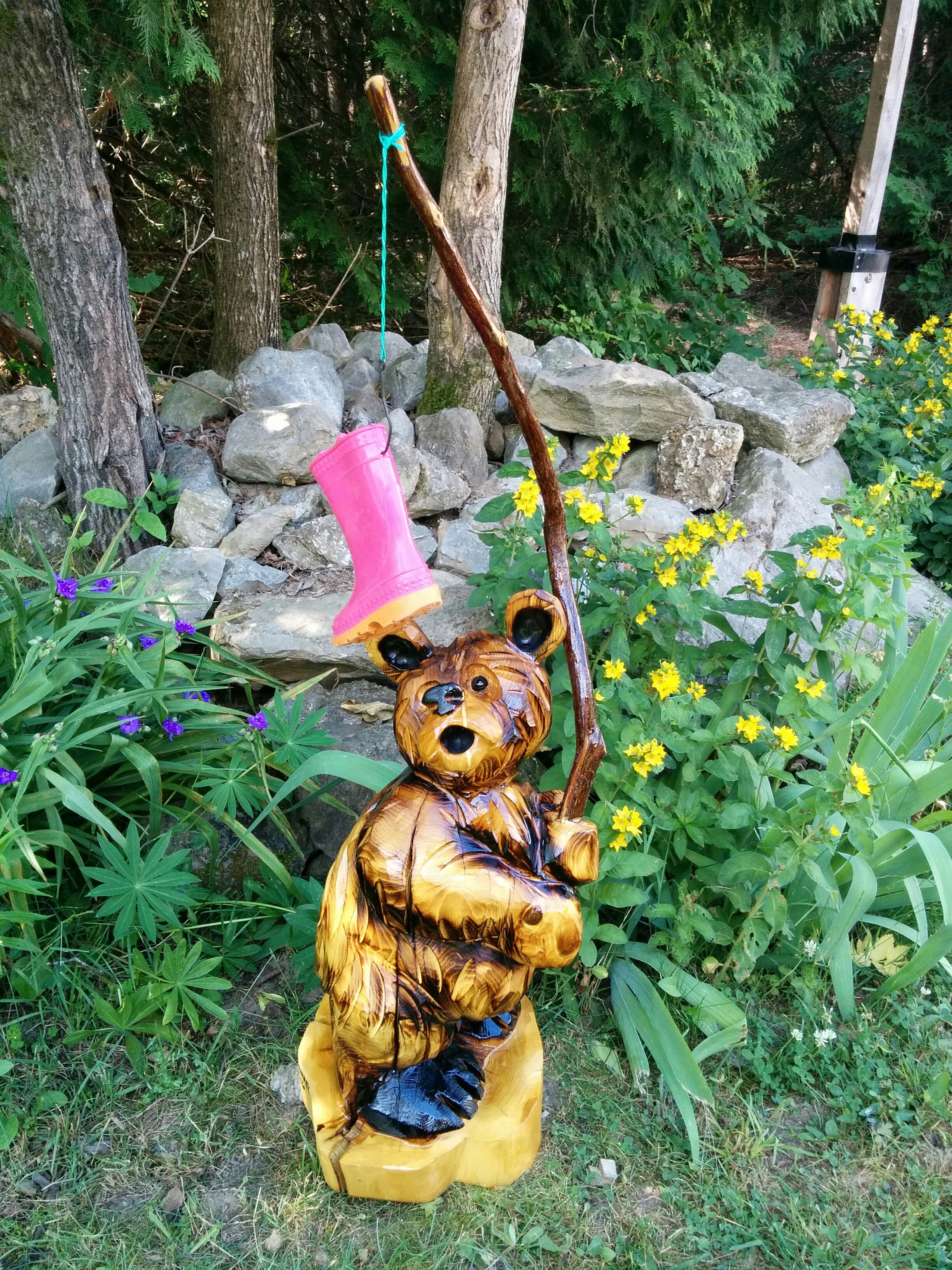 Standing fishing boot bear