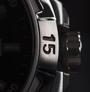 Silver watch crown detail picture.