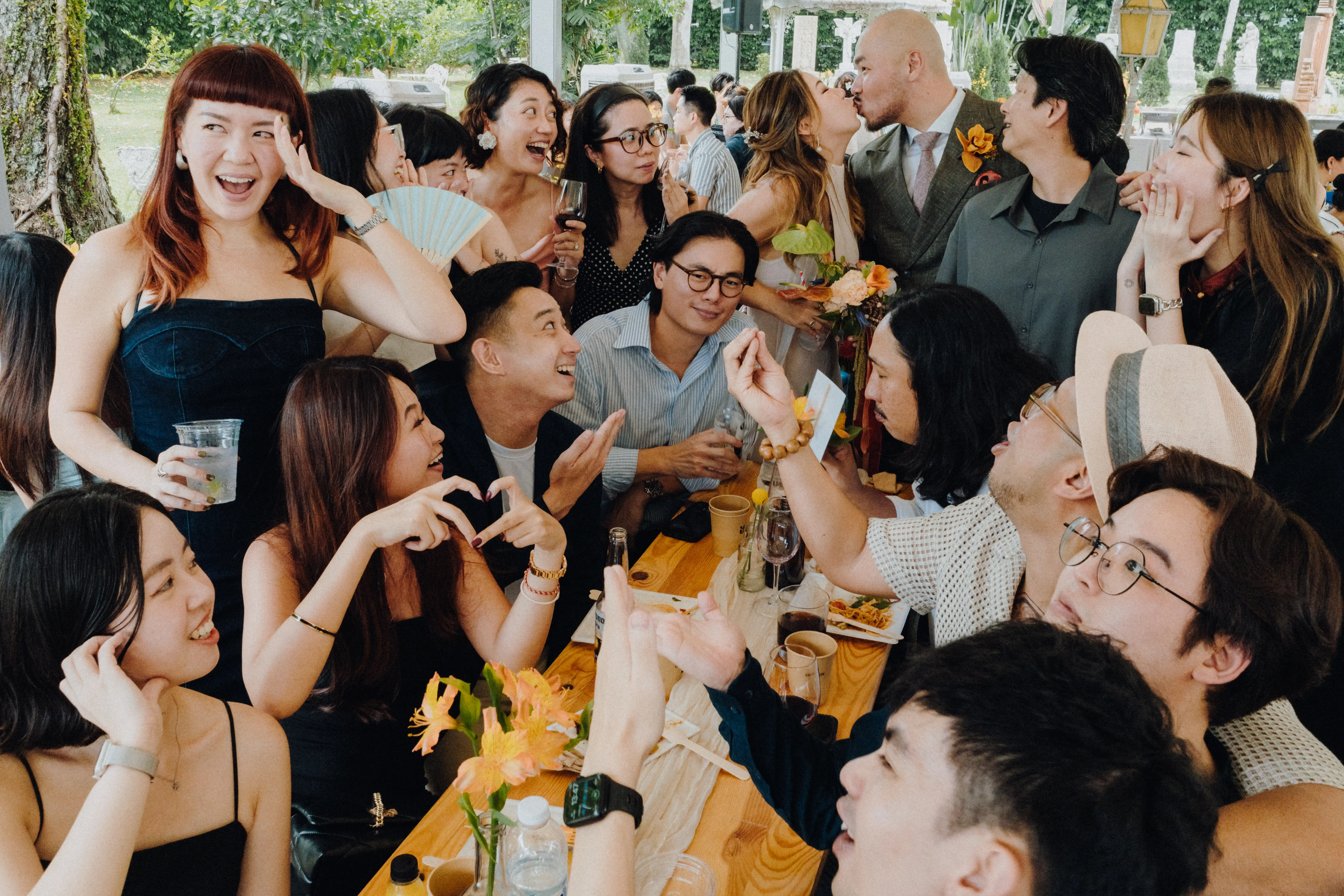 Wedding guests having fun documentary photography