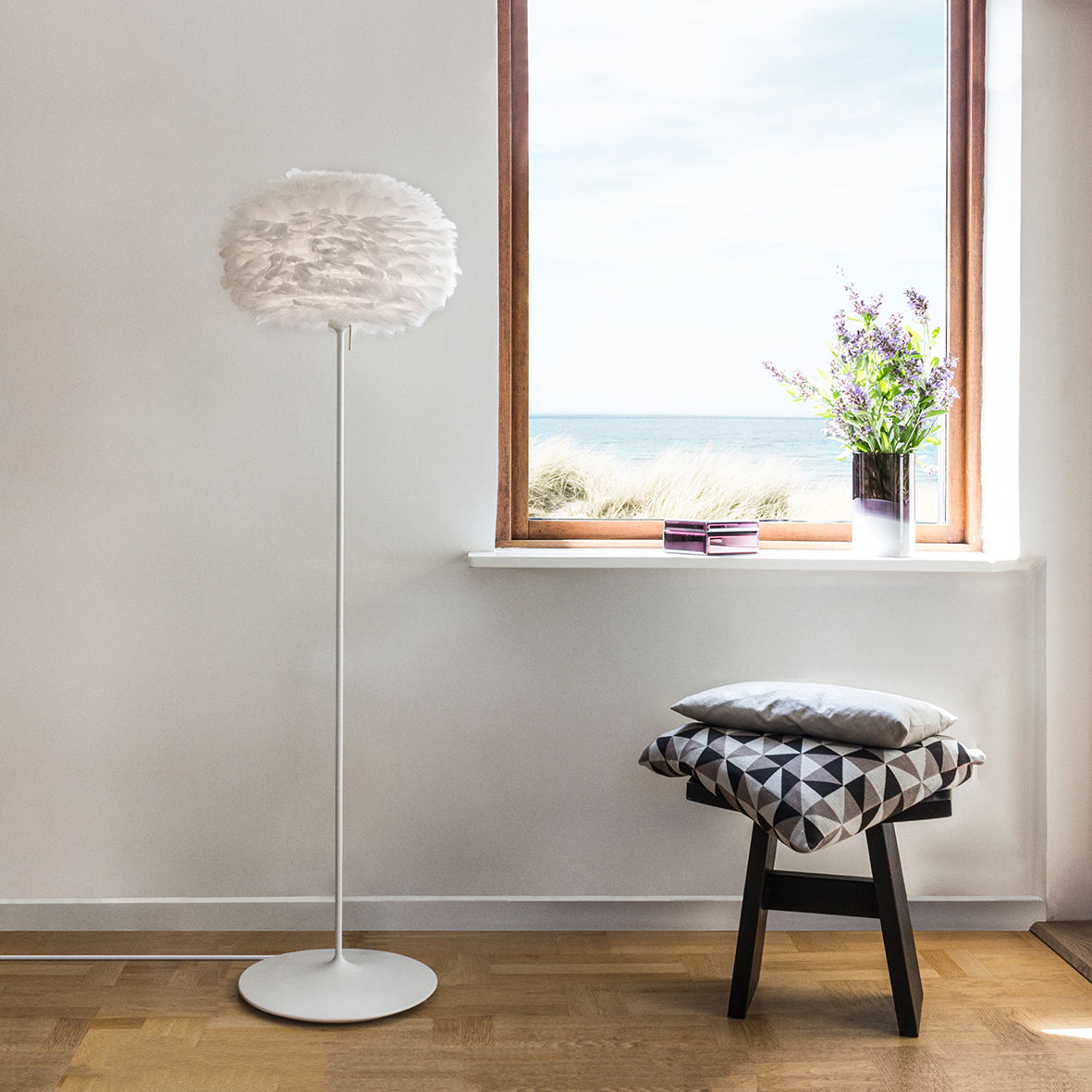 Eos lamp with champagne floor stand