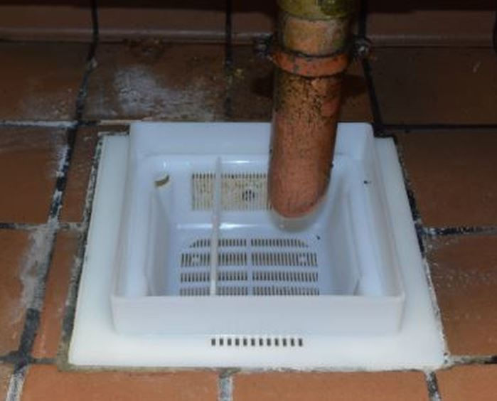 can you drain a hemorrhoid at home