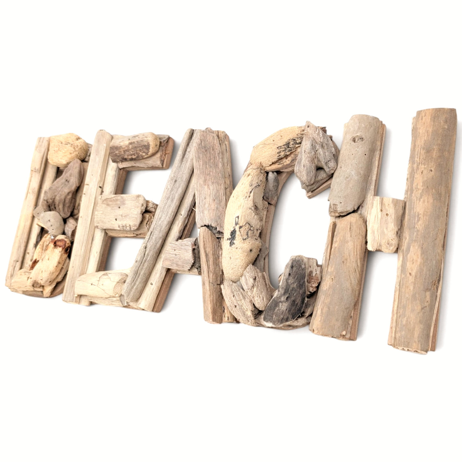 Joined driftwood wall sign spelling the word BEACH