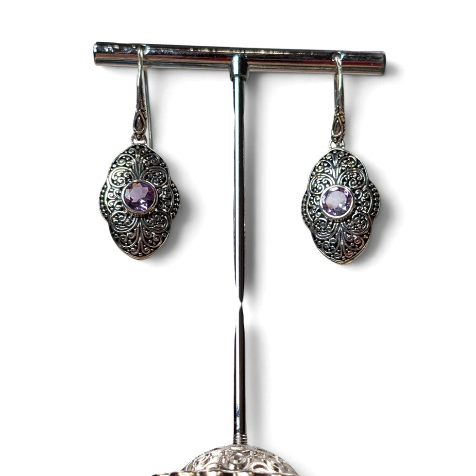 Thumbnail: Pair of silver gemstone earrings with deep purple focal points