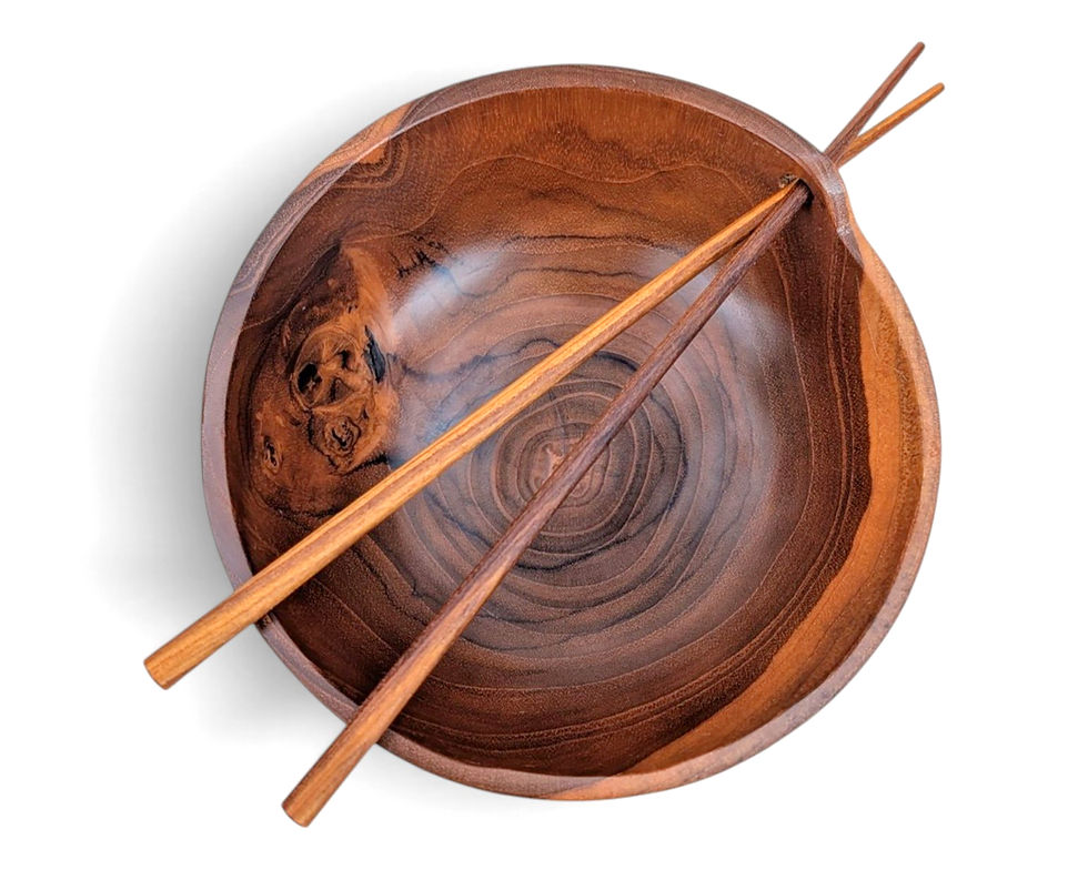 Thumbnail: A lightweight wooden bowl isolated on a plain white background.