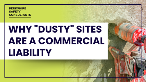 A drill drilling into a wall making dust