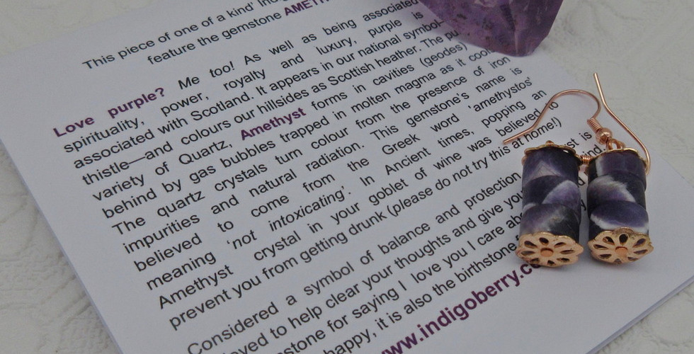 Indigo Berry packaging for amethyst earrings with information about the gemstone