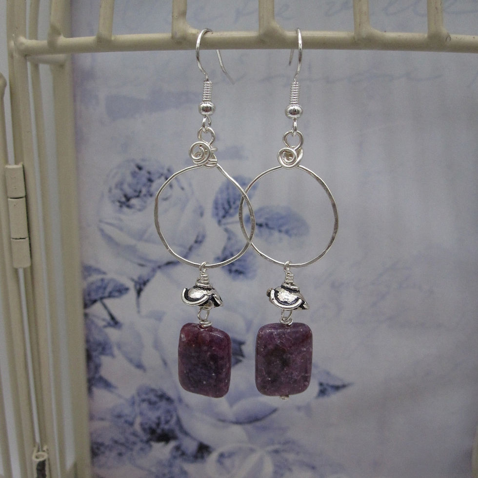 Dangly earrings with silver plated wire hoop and flower bead caps. Purple lepidolite gemstone.