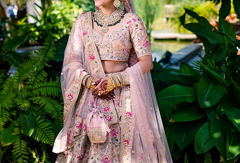 Pakistani Indian Bridal wearing wedding Lehenga sharara and jewelry.jpg