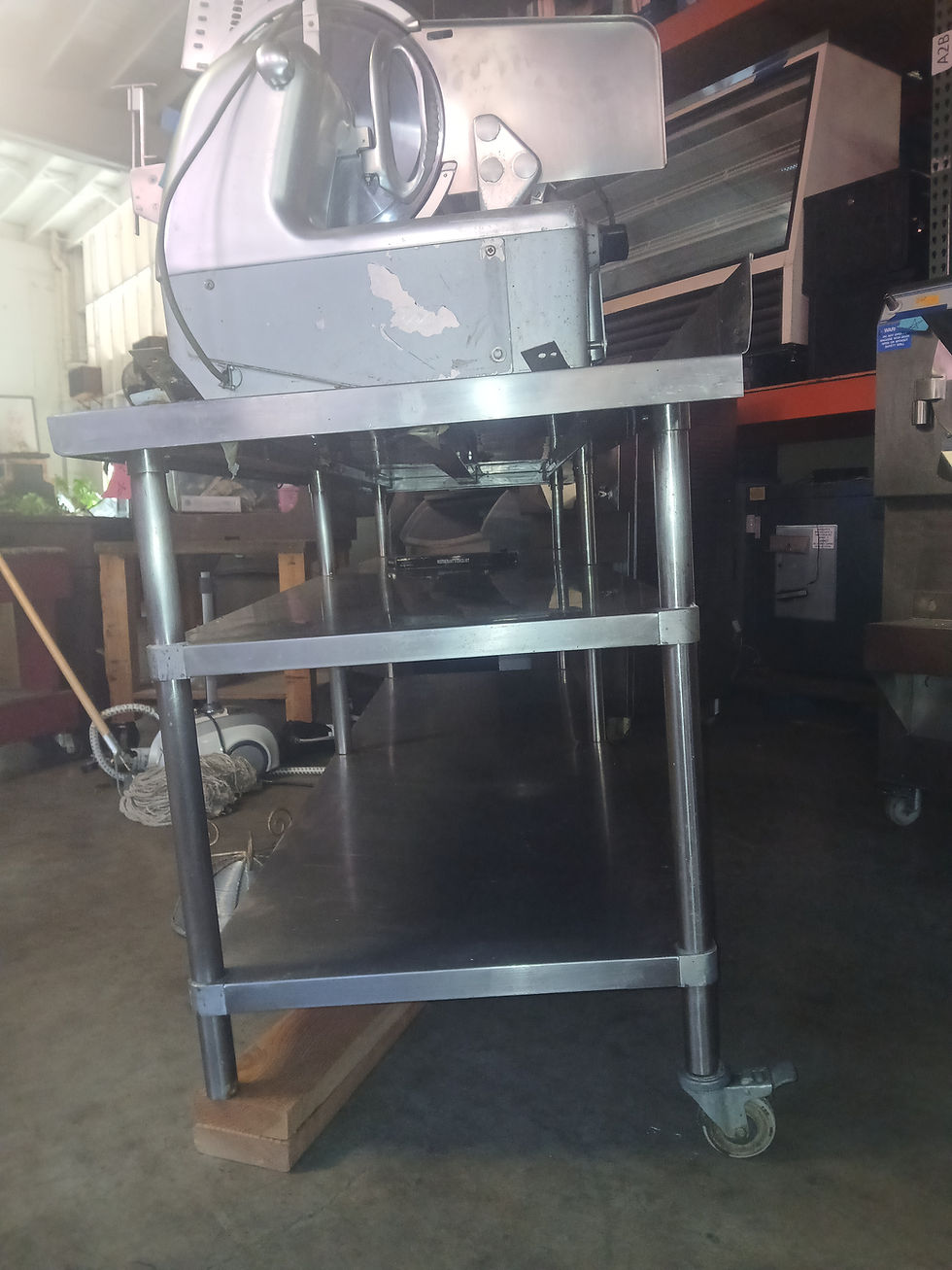 STAINLESS STEEL TABLE WITH CASTERS