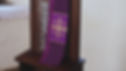 Purple Catholic Priest Stole with Embroidered Jerusalem Cross Hanging Over Grate of Simple