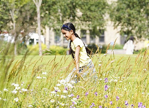 girl-running-in-gardens-in-bradford-2025.jpg