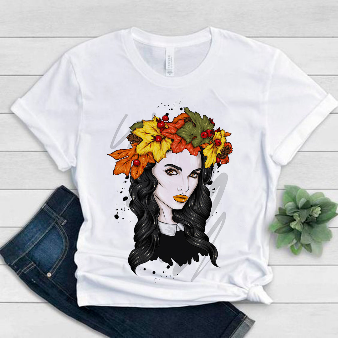 Autumn leaves adorn woman's head on white t-shirt