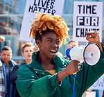 protestors-with-placards-and-megaphone-on-black-li-2022-03-16-22-18-31-utc.jpg