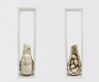 5b Self Reference No. 2  24..25x6.25x4.75 inches seven aquaresin heads & wood.jpeg
