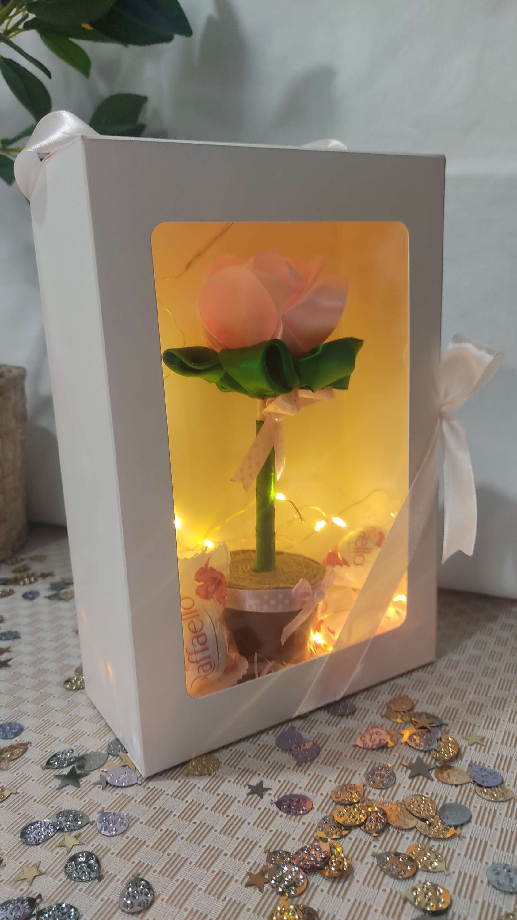 Satin rose pen in display box with light and Raffaello bonbons