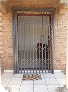 Security door for a pivot door