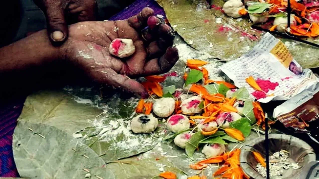 Pind Daan ritual: hands preparing offerings