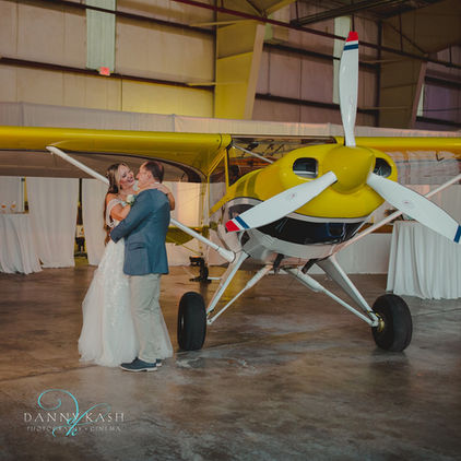 An airplane hangar wedding at Robertson Airport in Plainville, Connecticut