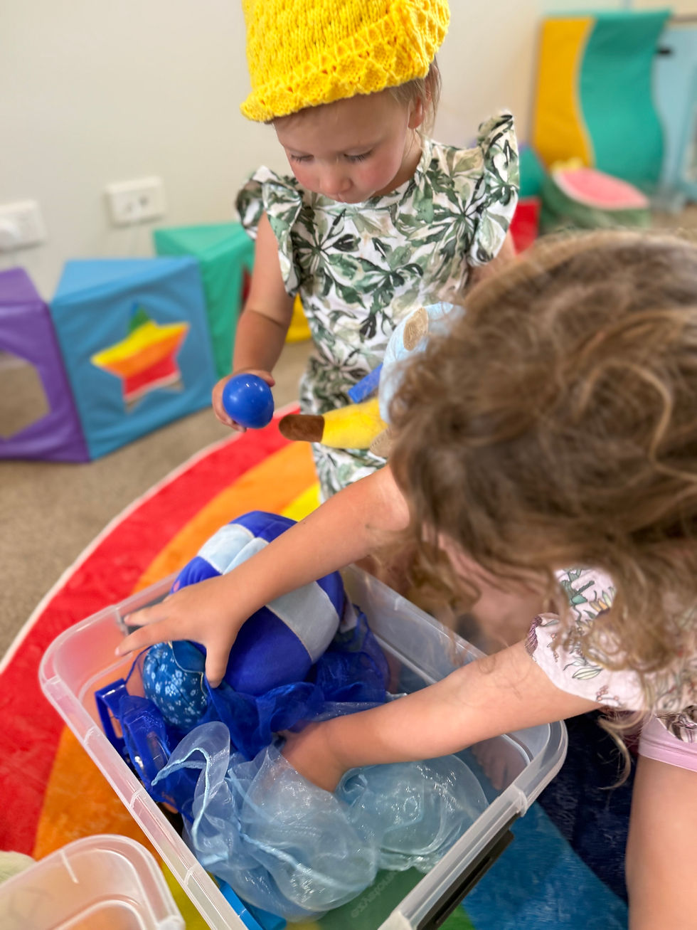 Children are actively involved, smiling, and excited to participate—creating a positive foundation for healthy eating.