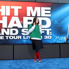 Billie Eilish performing live on stage in 3D concert film scene