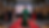 Eye-level view of a stylish woman wearing a flowing silk dress at an outdoor film festival