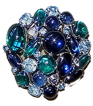 Vintage WEISS Designer Costume Jewelry Brooch - Adorn your ensemble with this exquisite vintage brooch by WEISS. Intricately designed with cabochon glass stones, accented by sparkling crystal rhinestones, and meticulously set in a robust metal alloy frame. This brooch is a standout piece that captures the essence of vintage luxury and the artistry of the WEISS brand, perfect for collectors and fashion connoisseurs seeking a blend of classic style and costume jewelry charm.