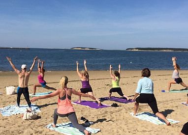 Della Yoga on the Beach class photo.jpg