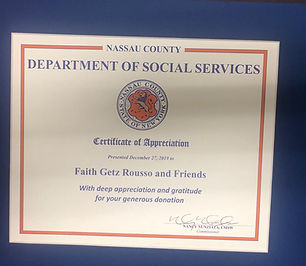 Faith Getz Rousso, ESQ. receeived certificate of appreciation from Nassau County Department of Social Services.