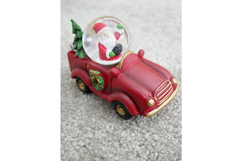 Christmas Snow globe Santa in a Red Car