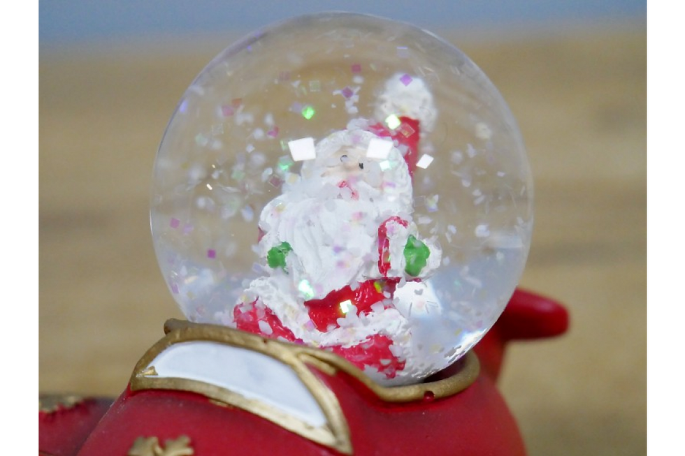 Thumbnail: Christmas Snowglobe Santa in a plane