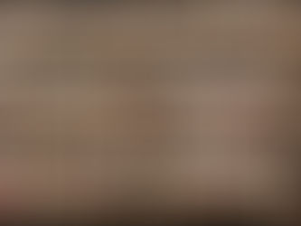 Row of Burgundy bottles on store shelves