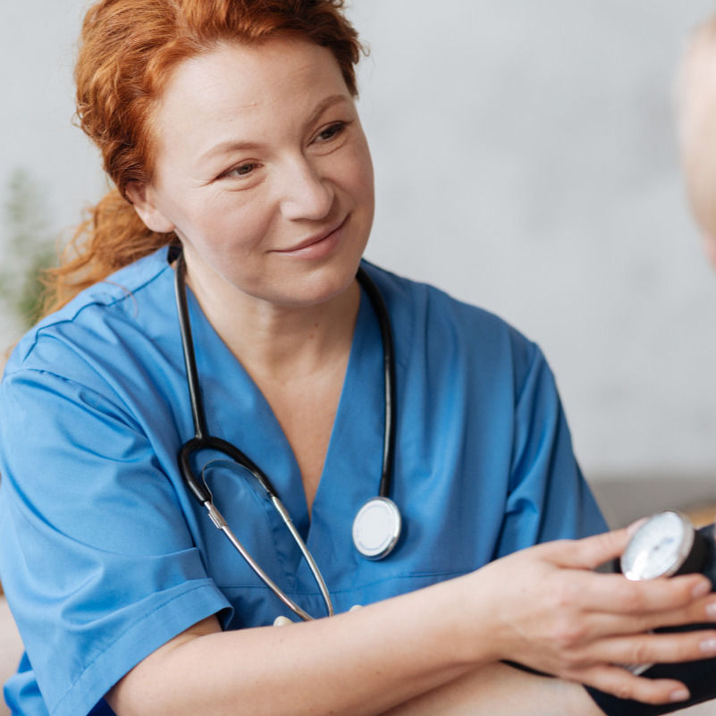 Nurse checking blood pressure_edited_edited.jpg