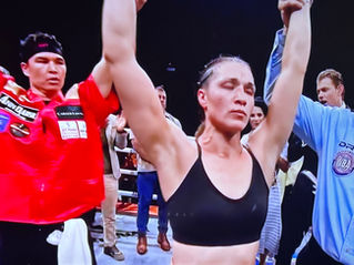 Han defeats Holm with 7th round  technical decision