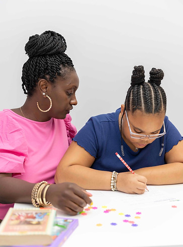 Tutor helping student with math problems