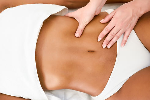 woman-receiving-abdomen-massage-spa-wellness-center.jpg
