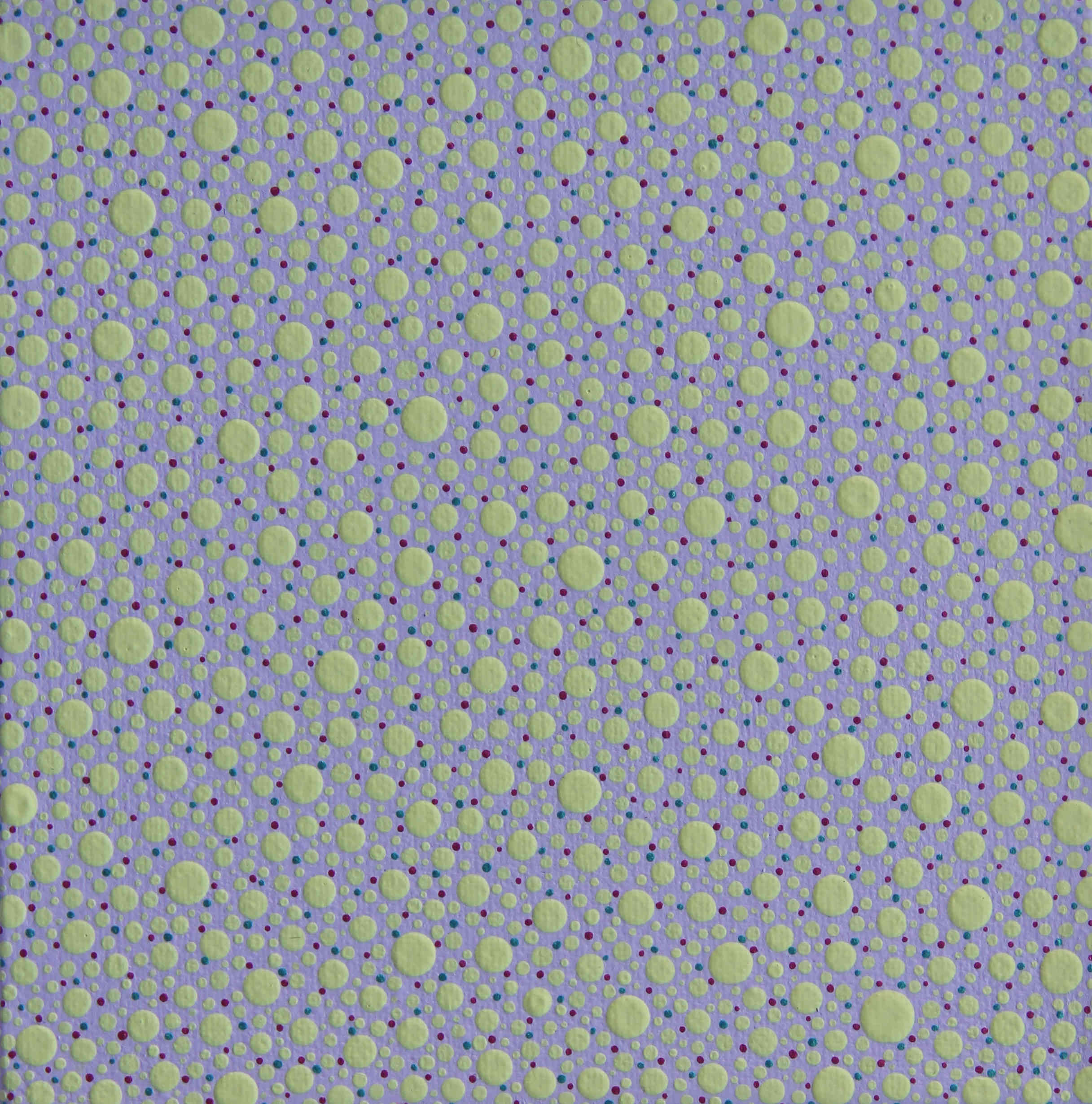varying sizes greenish color dots and smaller black dots and pink in spaces in between dots