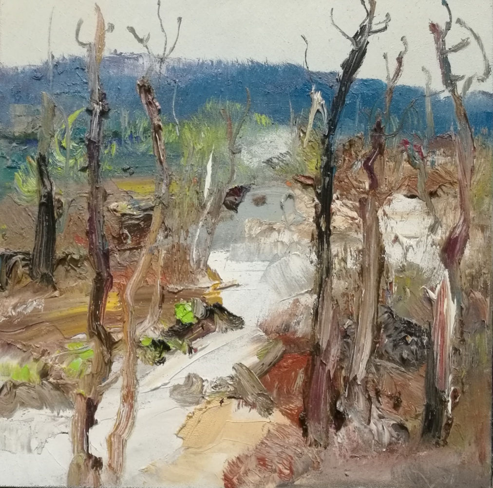 abstract like painting white creek among trees with no leaves brown ground bluish hill in background