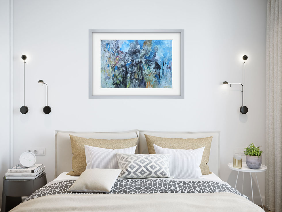 painting on light gray wall above large bed with multiple white pillows tan bed sheets blanket