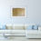 Thumbnail: painting on light gray wall above very large L shaped white soft with small round coffee table in front
