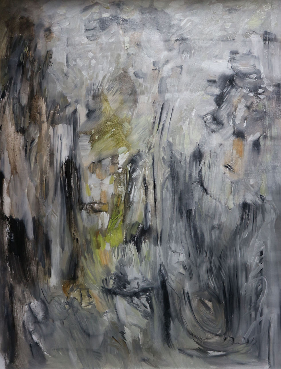 Abstract mostly black with dark to light left to right and little bright green in center