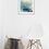 Thumbnail: painting on gray wall hangs over white chair and wicker basket