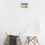 Thumbnail: painting on white wall above white table chair and wicker basket