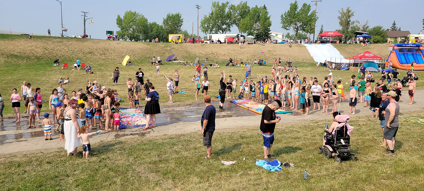 Crowd of people about to have a water fight